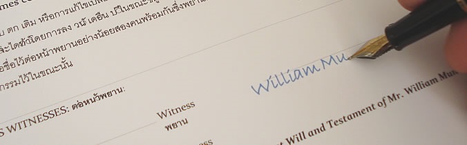 Detail of a signed Last Will document showing the signature and witness section